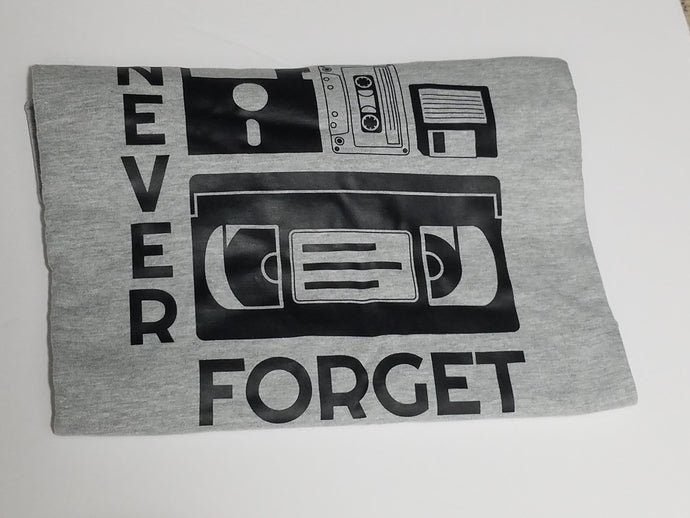 Black ink Never Forget design with cassette, VHS, and retro icons on heather grey unisex short sleeve Chozzen Few cotton T-shirt